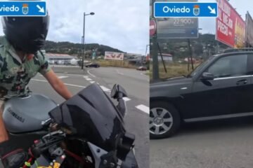 Un conductor se distrae mirando el móvil y casi atropella a un motorista al saltarse un ceda en una rotonda de Oviedo: “Este vídeo debería ser suficiente para que la DGT le cite para el curso de reeducación vial”